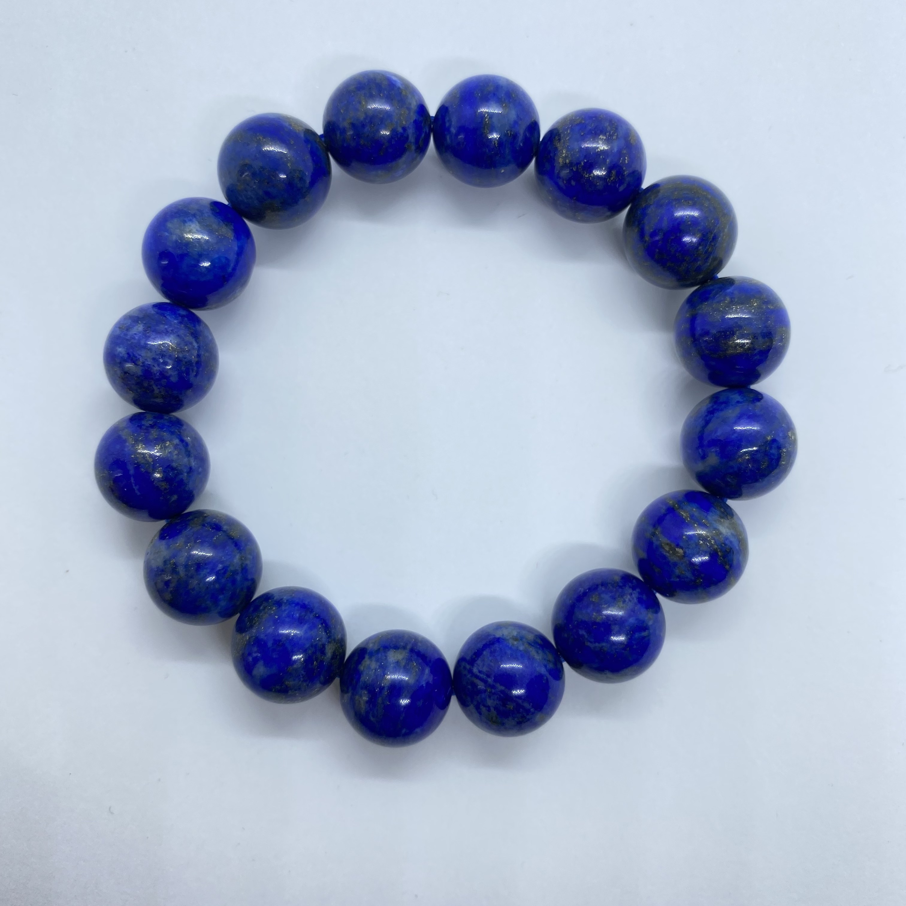 Lapis Lazuli ลาปิส ลาซูลี่, ลาพิส ลาซูลี่ 12 mm นําความสุขใจ ความสมหวังและมีชีวิตที่สุขสบาย ทำให้เกิดความรักเข้าใจในหมู่พวกพ้องและหุ้นส่วนในการทําธุรกิจ