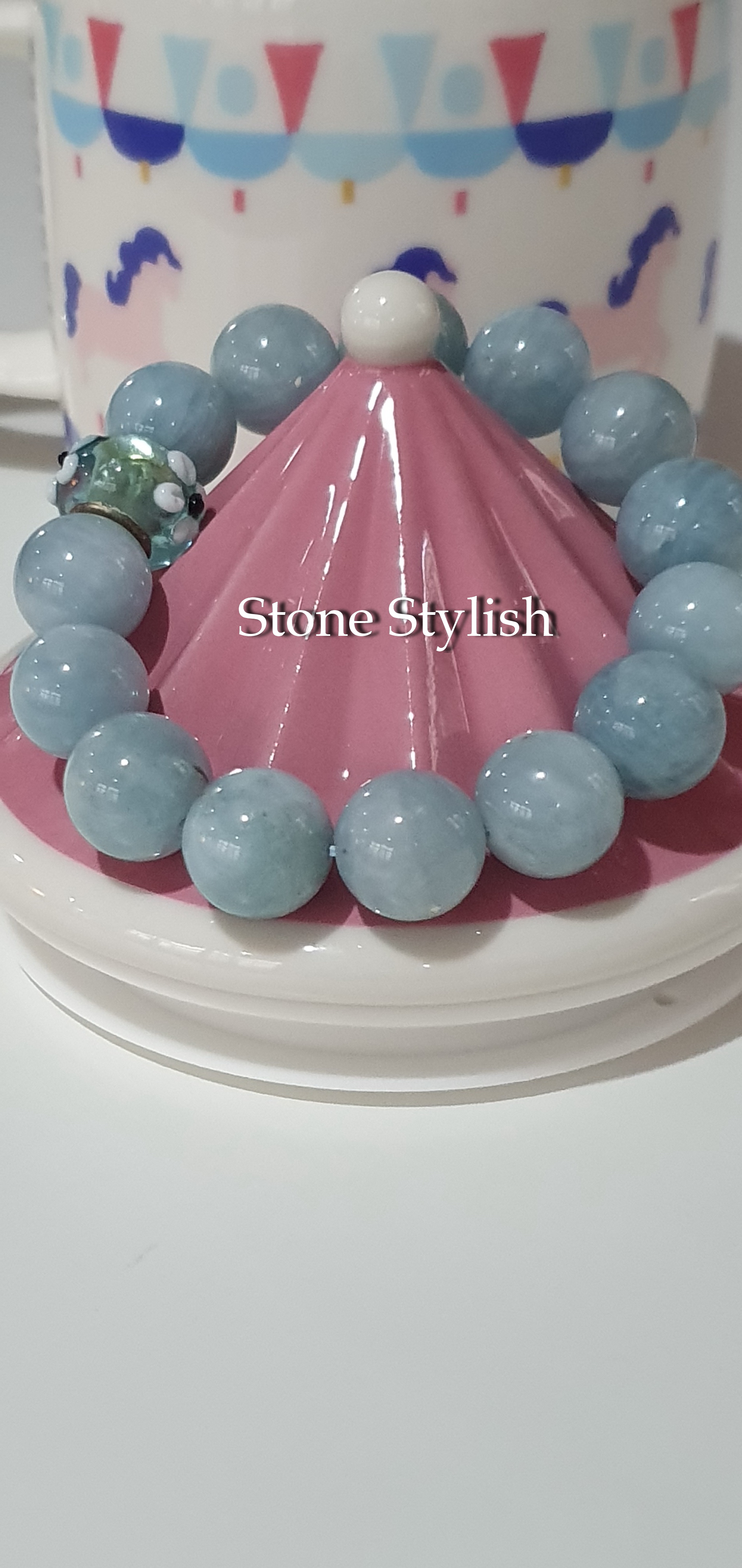 สร้อยข้อมือ อความารีน (Aquamarine) เกรด AAA ขนาด 10 มิล แต่งหัวลูกปัดดอกไม้สีฟ้า