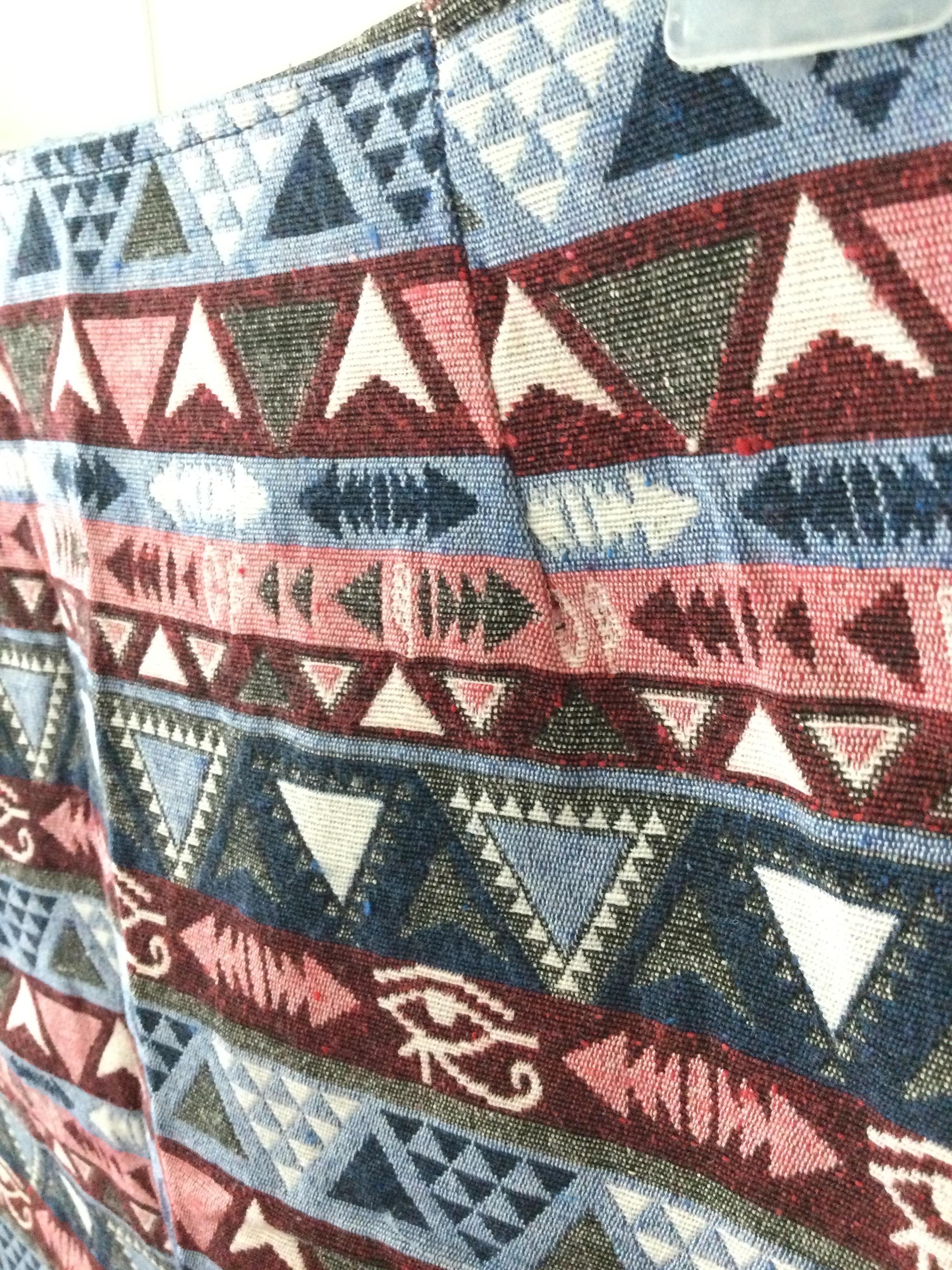 ชุดเซตเสื้อแขนกุดสีส้มมาพร้อมกระโปรงผ้าทอลายโบฮีเมียนทรงเอ