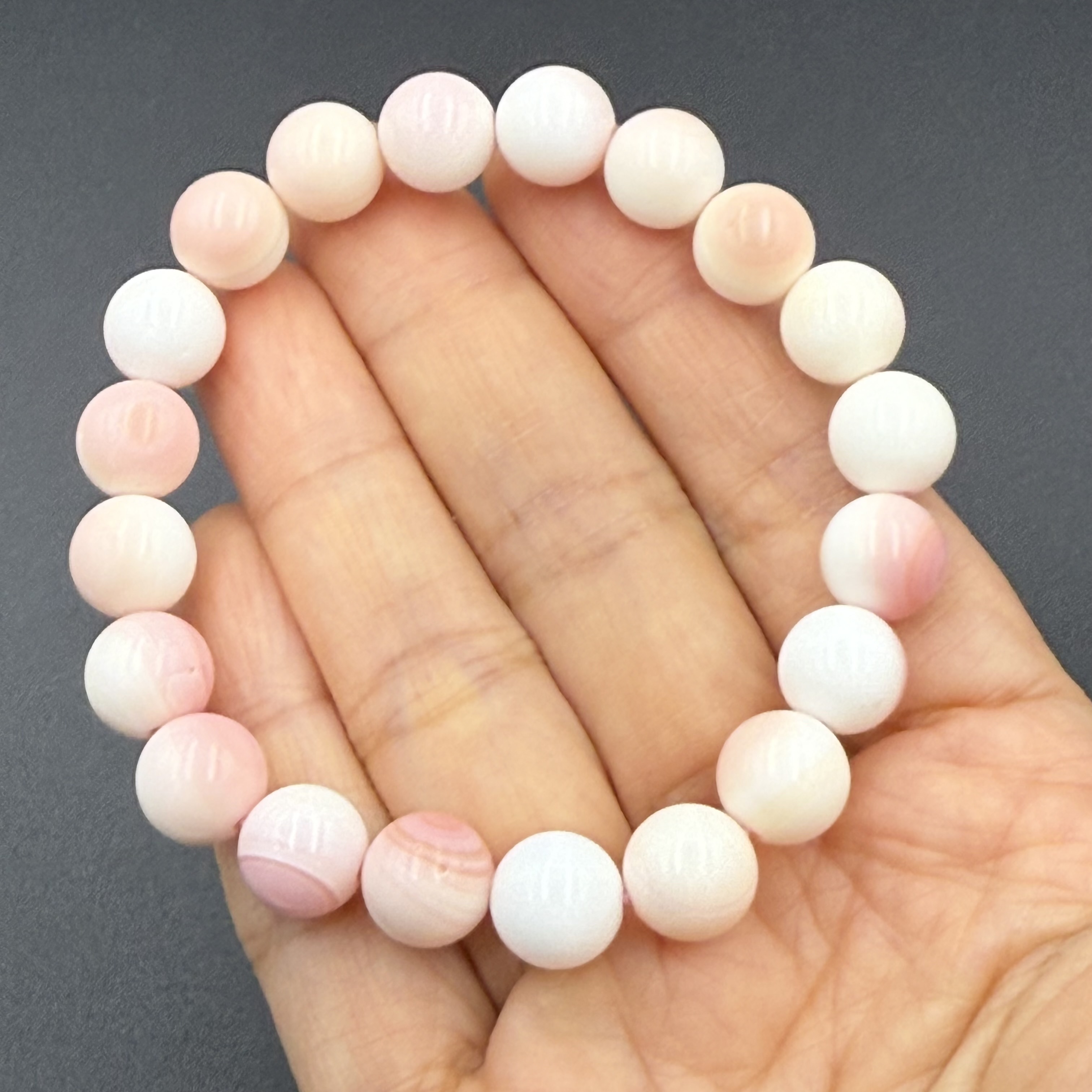 Pink Queen Conch Shell พิงค์เชลล์ เป็นหินแห่งโชคลาภและความสงบสุข เป็นพลังงานในด้านการดึงดูดคู่รักที่แท้จริงของเจ้าของ การได้พบความสุข 9.5-10 มม สำเนา