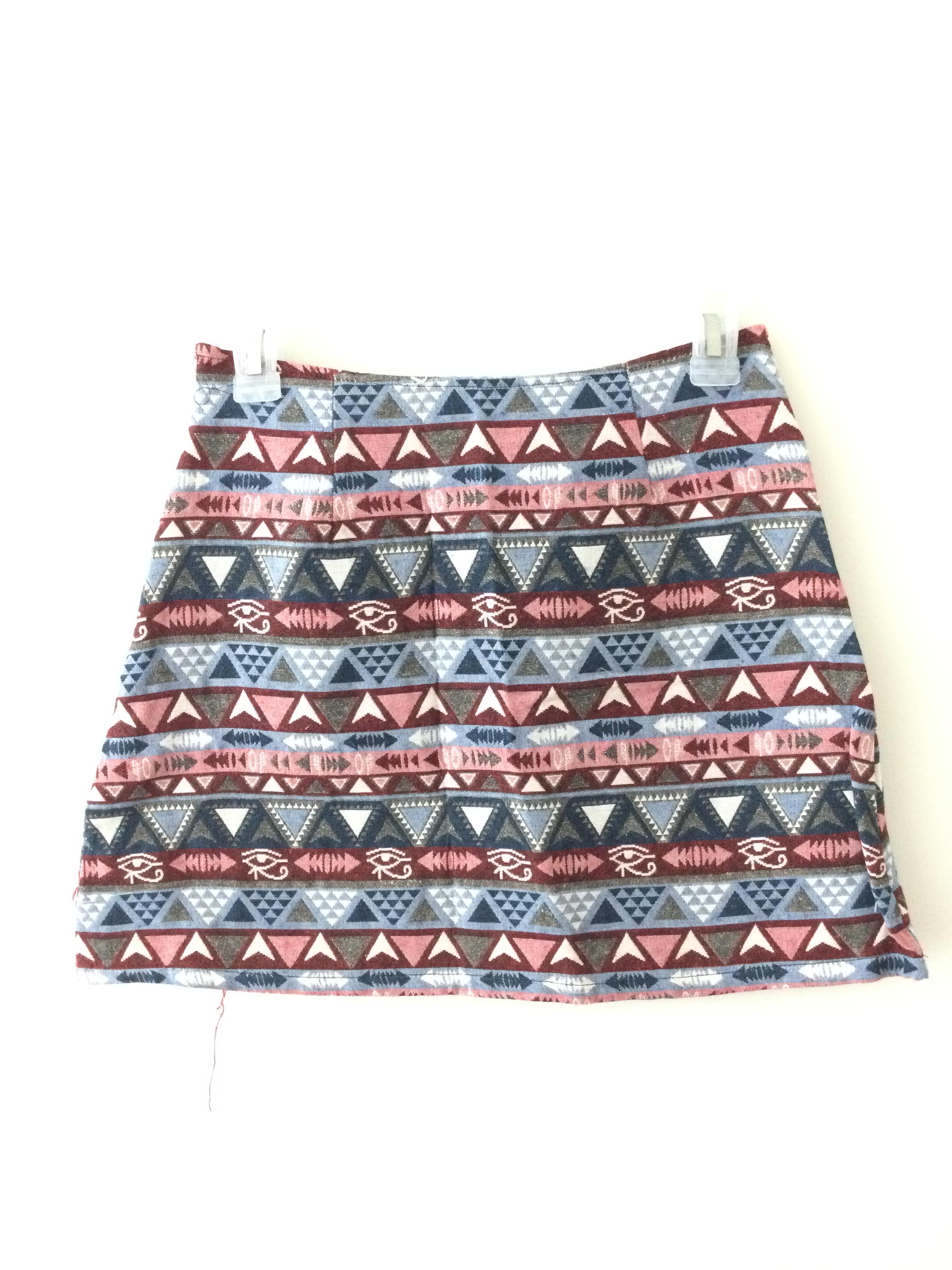 ชุดเซตเสื้อแขนกุดสีส้มมาพร้อมกระโปรงผ้าทอลายโบฮีเมียนทรงเอ