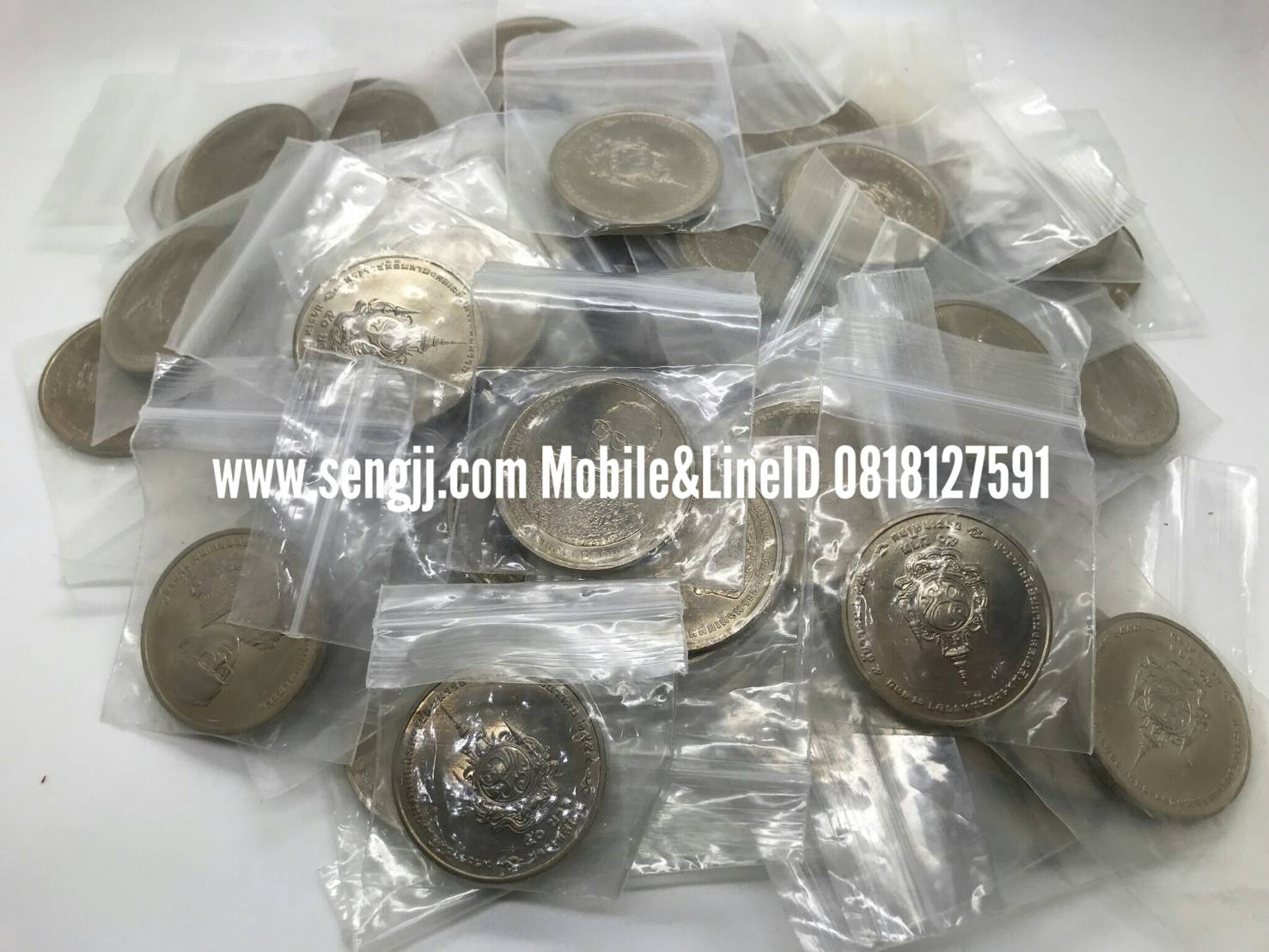 เหรียญกษาปณ์นิเกิล 50 บาท ที่ระลึก 7 รอบ ในหลวง ร.9 84 พรรษา พ.ศ.2554(ราคาต่อเหรียญ)