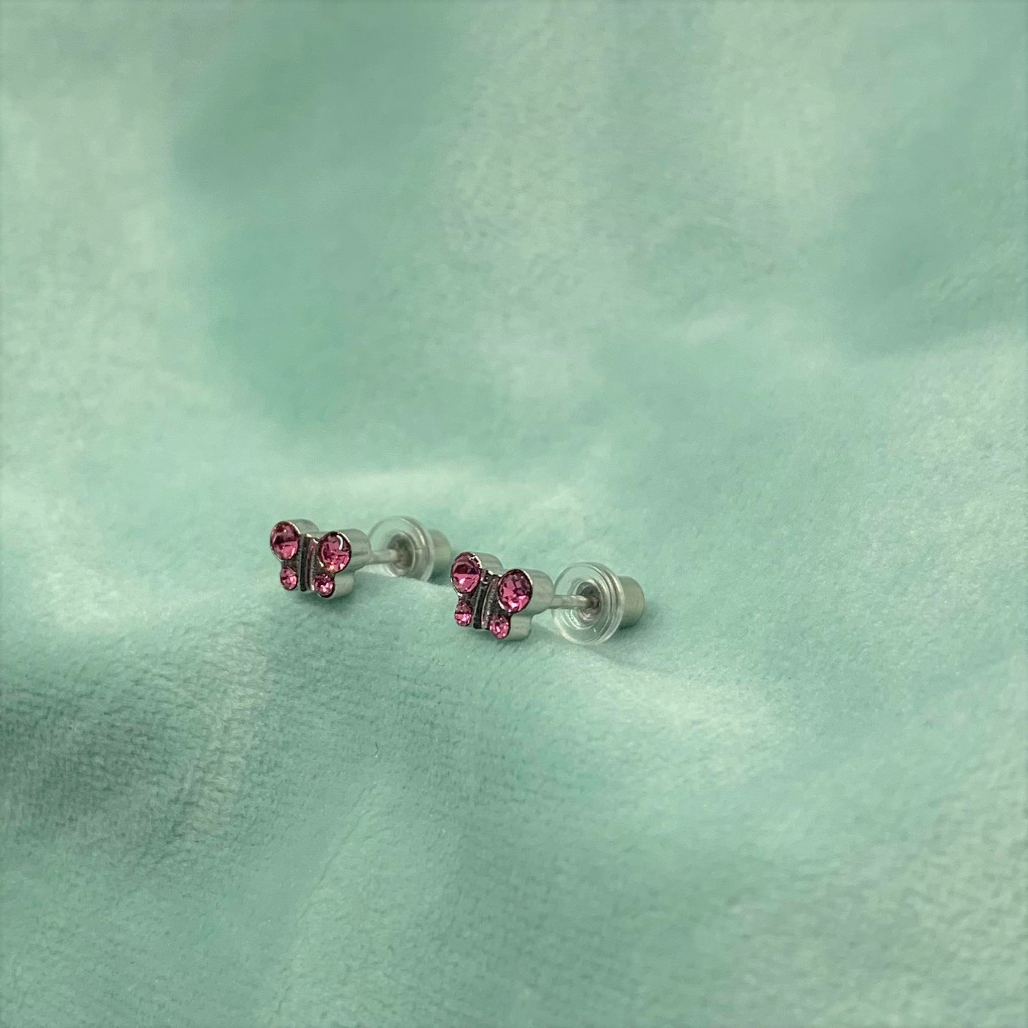 (สำหรับเจาะที่ร้านเท่านั้น)แป้นหมวก สแตนเลสเกรดการแพทย์ ผีเสื้อCZชมพู แพคเกจปลอดเชื้อ ปลอดภัย100%