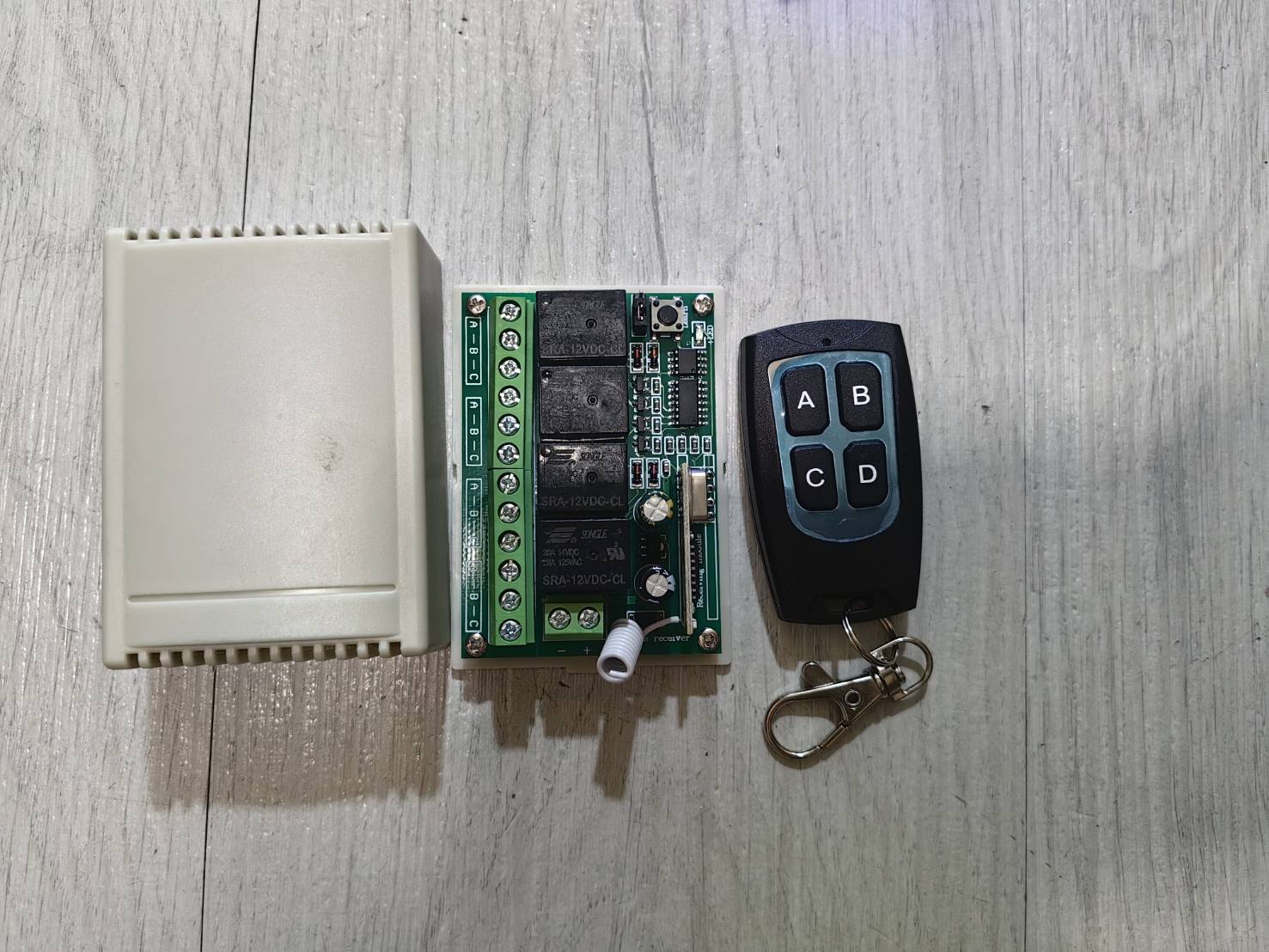 EA11 วงจรรีโมท 12V 4CH สำหรับ DIY ควบคุมประตู มอเตอร์ หลอดไฟ ระยะไกล