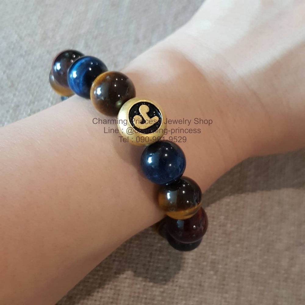 หัวนะโม หรือ หัวนอโม รุ่นบารมีศรีวิชัย วัดพระมหาธาตุวรมหาวิหาร จ.นครศรีธรรมราช ร้อยพร้อม Tiger Eye 3 Colors หินสามทหารเสือ 12 มม แก้ปีชง พลิกฟื้นดวงชะตา แคล้วคลาดปลอดภัย หินแก้ปีชง