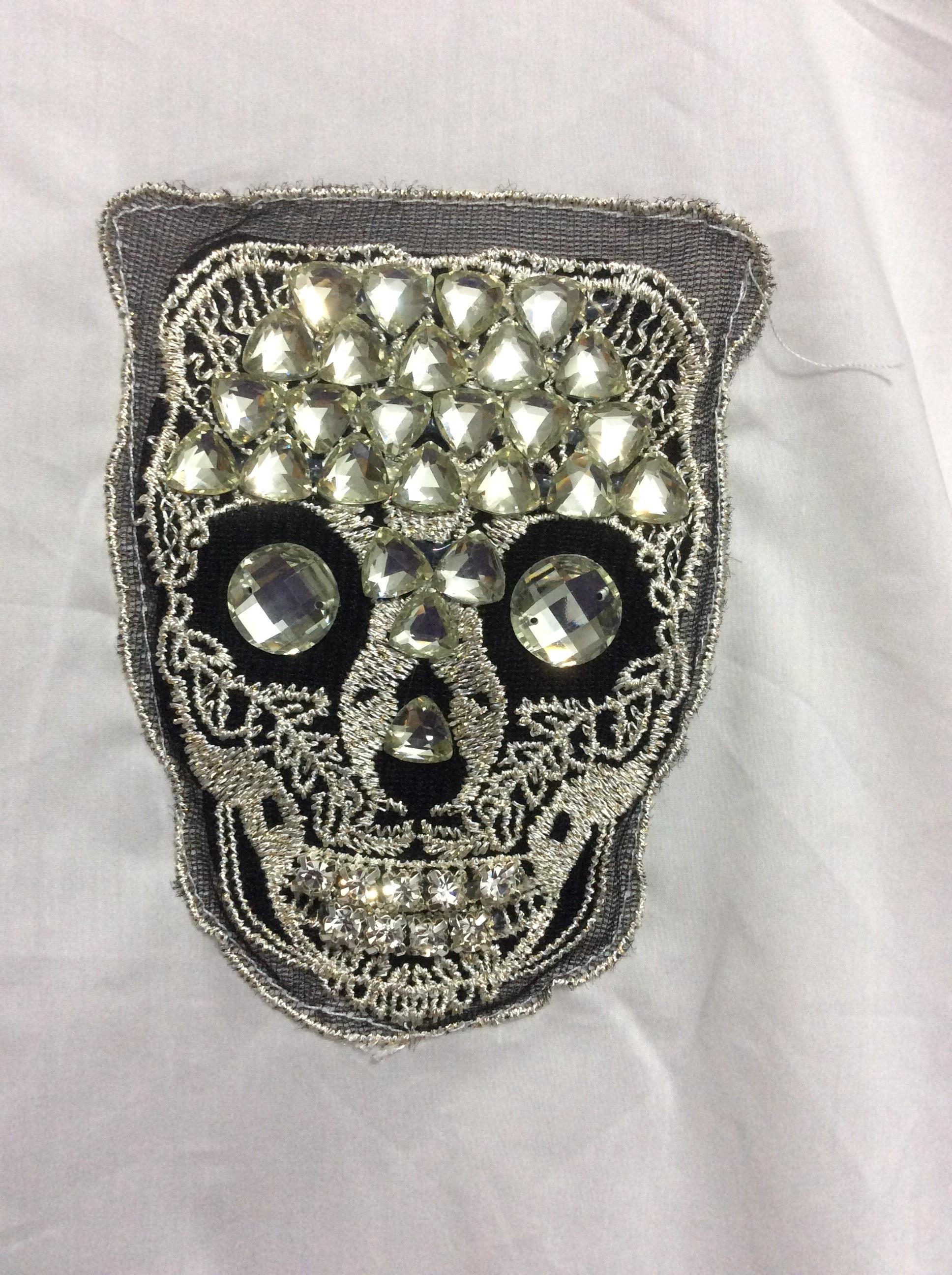 New!! เสื้อเกาหลีทรงหลวม แต่งหัวกะโหลก ช่วงเอวมีเชือกผูก