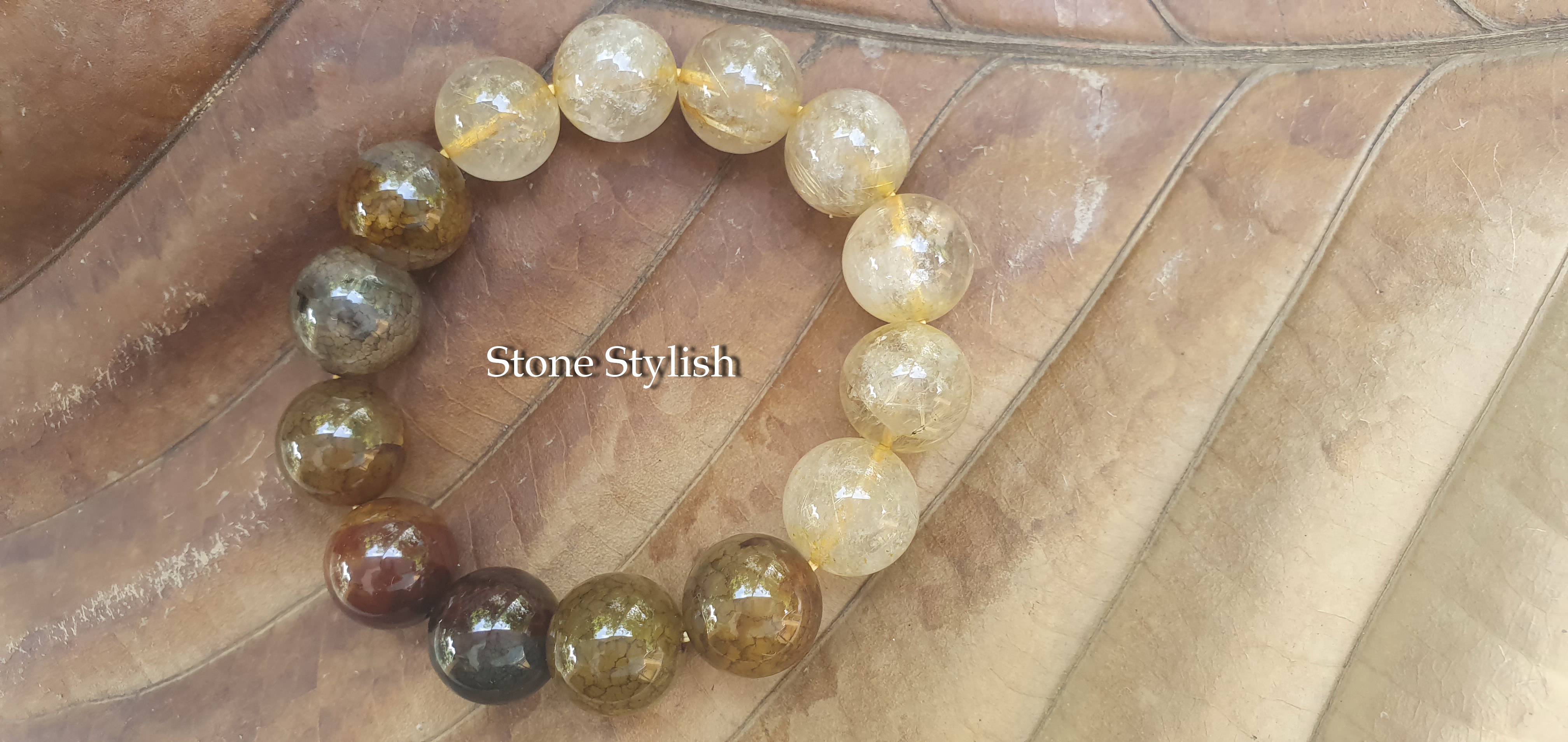 **สินค้าหมด**สร้อยข้อมือ ไหมทอง (Gold Rutilated Quartz) ร้อยผสม เกล็ดมังกร (Impress Stone)ขนาด 10 มิล