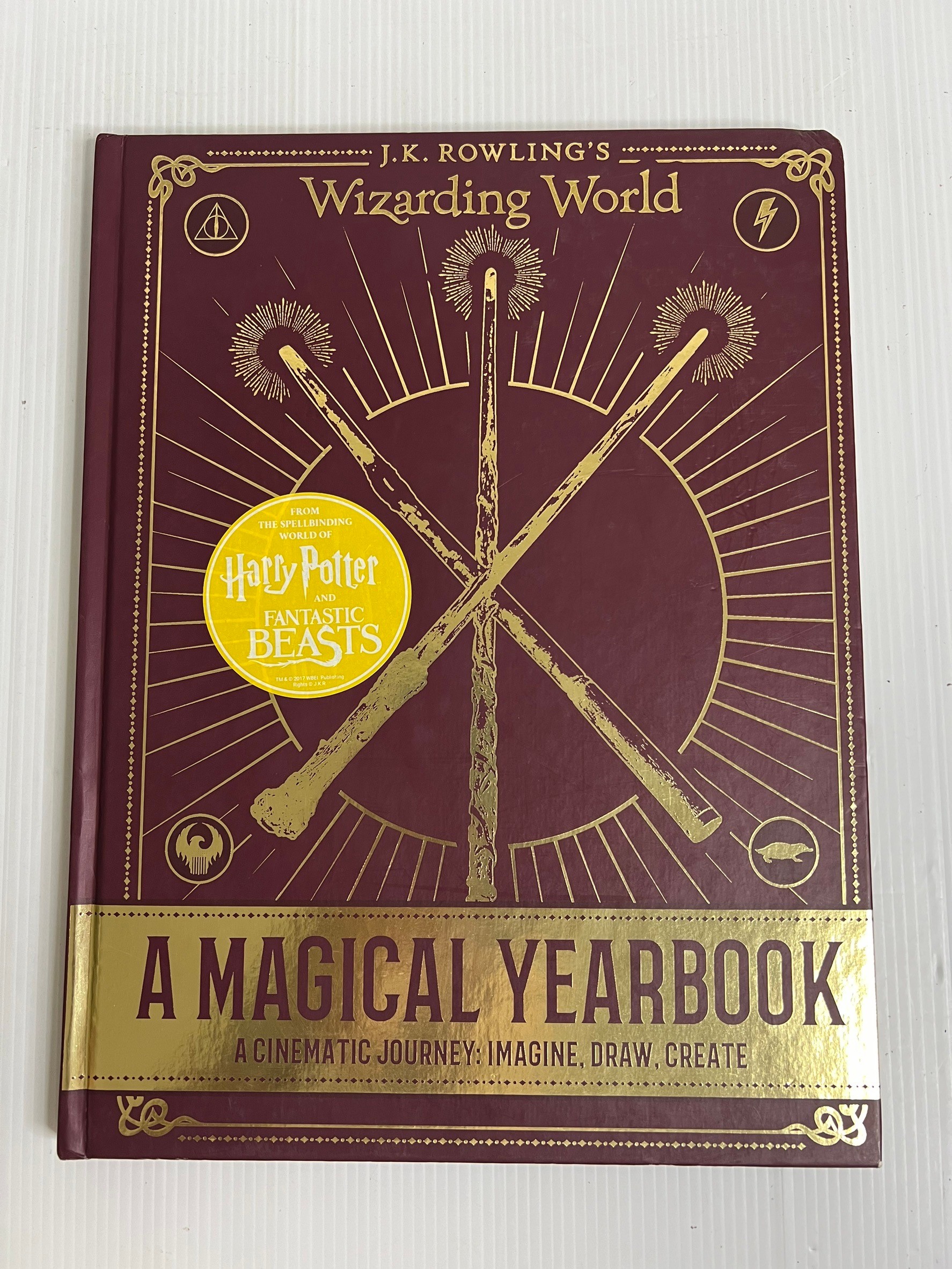 J.K. Rowling's Wizarding World: A Magical Yearbook Scholastic January 20, 2018 90-99% Hardcover