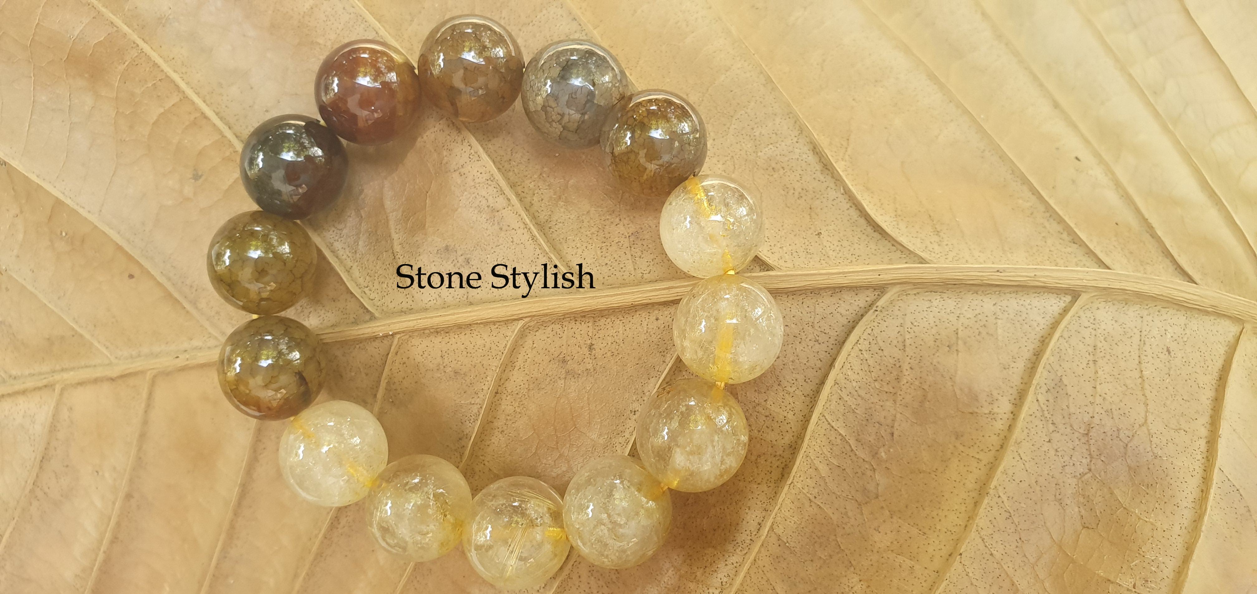 **สินค้าหมด**สร้อยข้อมือ ไหมทอง (Gold Rutilated Quartz) ร้อยผสม เกล็ดมังกร (Impress Stone)ขนาด 10 มิล