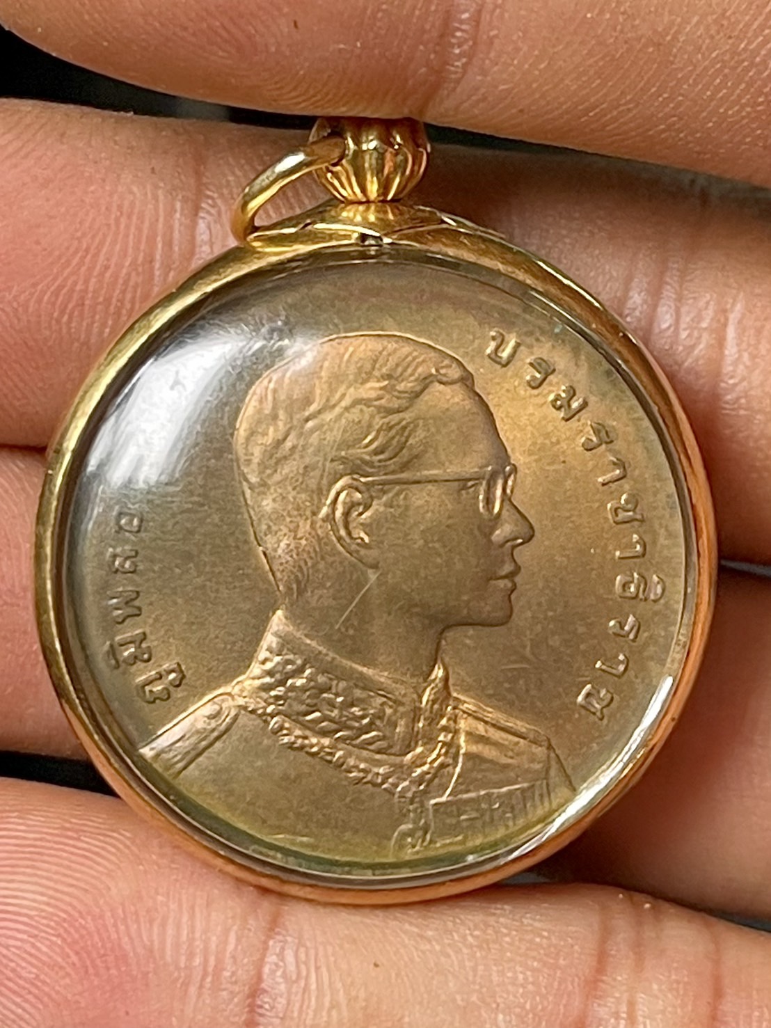 เหรียญที่ระลึก รัชกาลที่9 หลังพระสยามเทวาธิราช ปี2540 ทองแดง กรอบทอง