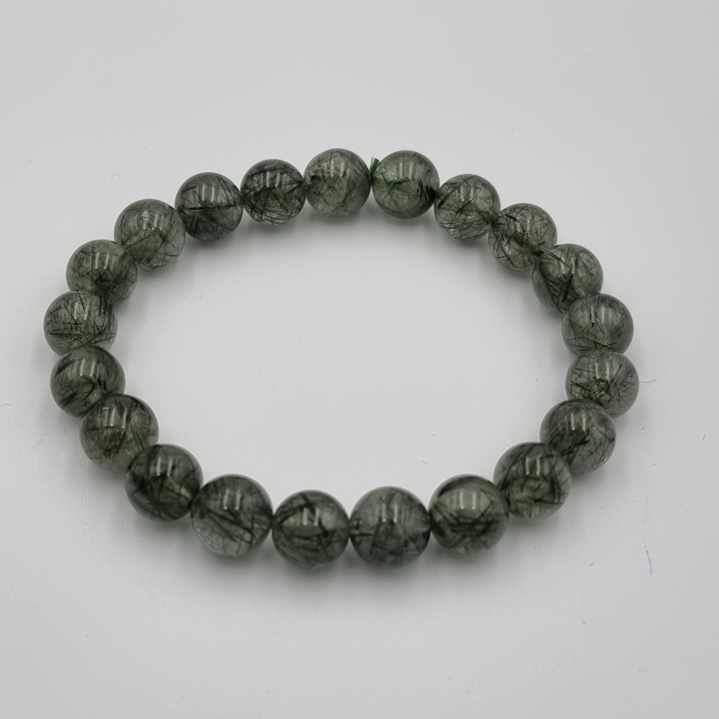ไหมเขียวเหนี่ยวทรัพย์ Green Rutilated Quartz 9.5 มม AAA ส่งผลให้นำพาโชคลาภเพิ่มทวีคูณ เส้นไหมละเอียด เห็นเป็นสีเขียว