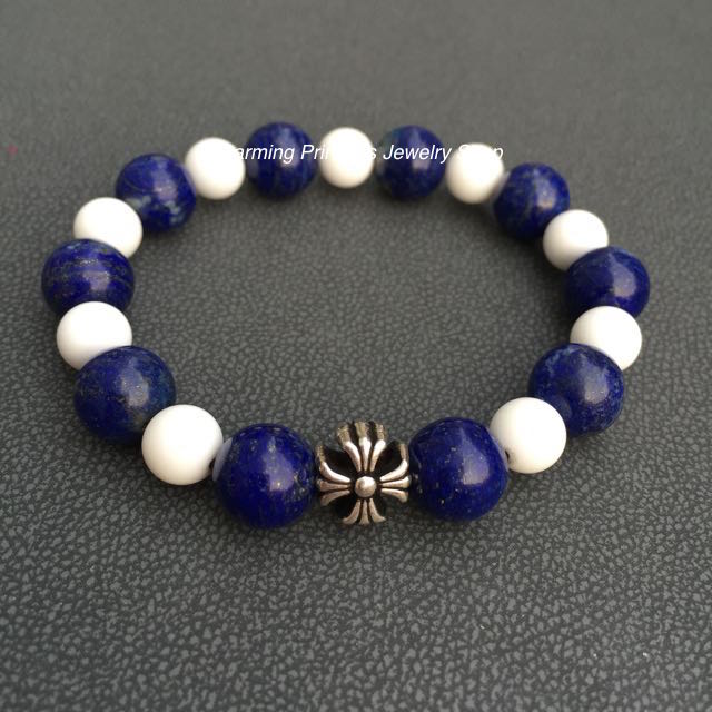 Lapis Lazuli ลาปิส ลาซูลี่, ลาพิส ลาซูลี่ 10 mm และ Shell 8 mm นําความสุขใจ ความสมหวังและมีชีวิตที่สุขสบาย ทำให้เกิดความรักเข้าใจในหมู่พวกพ้องและหุ้นส่วนในการทําธุรกิจ ประดับ“กางเขน” เงินแท้