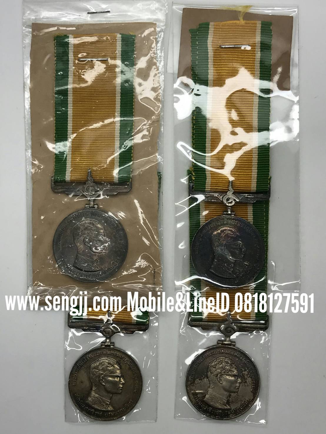 เหรียญแพรแถบเงิน ในหลวง ครองราชย์ 25 ปี พ.ศ.2514