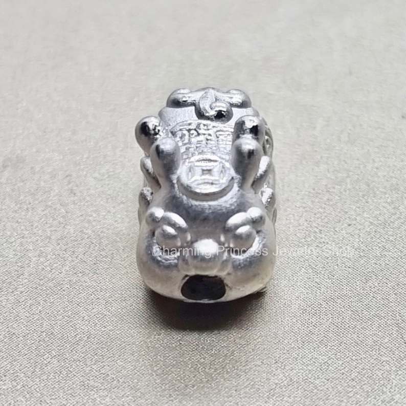 เบบี้ปี่เซี๊ยะ ชาร์มปี่เซี๊ยะ เงินแท้ 99.99% ตัวคั่นสร้อยข้อมือ ชาร์มเงินแท้ 99.99% กว้าง 8 มม ยาว 12 มม