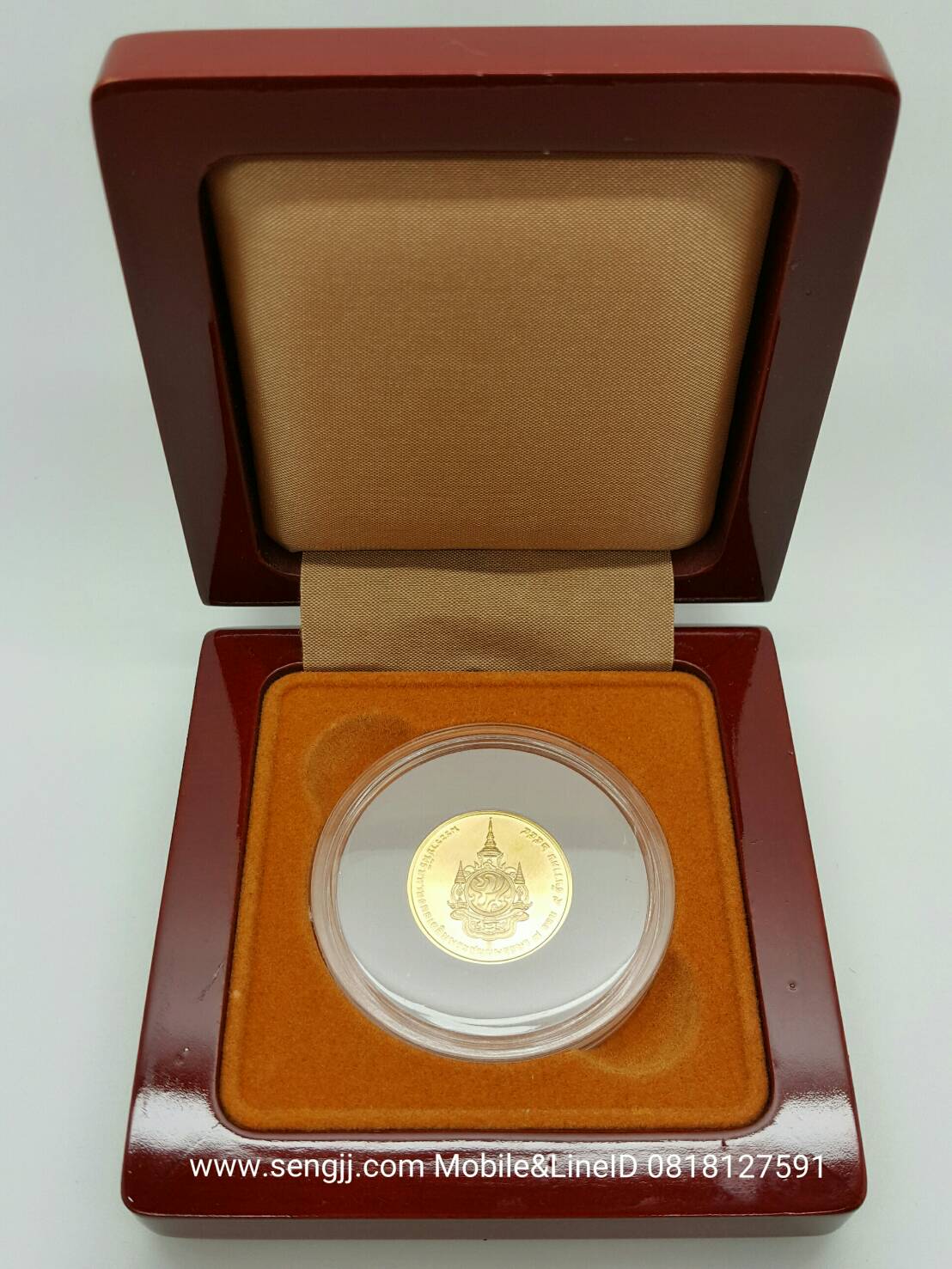 เหรียญทองคำที่ระลึก 7 รอบ 84 พรรษา ในหลวง พ.ศ.2554