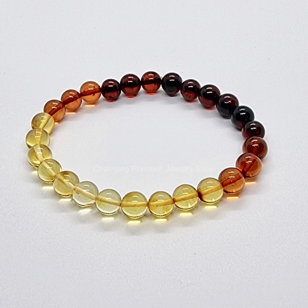 สร้อยข้อมืออำพันไล่เฉดสี 7-7.5 มม จากโปแลนด์ Multi Color Amber 7-7.5 mm from Poland