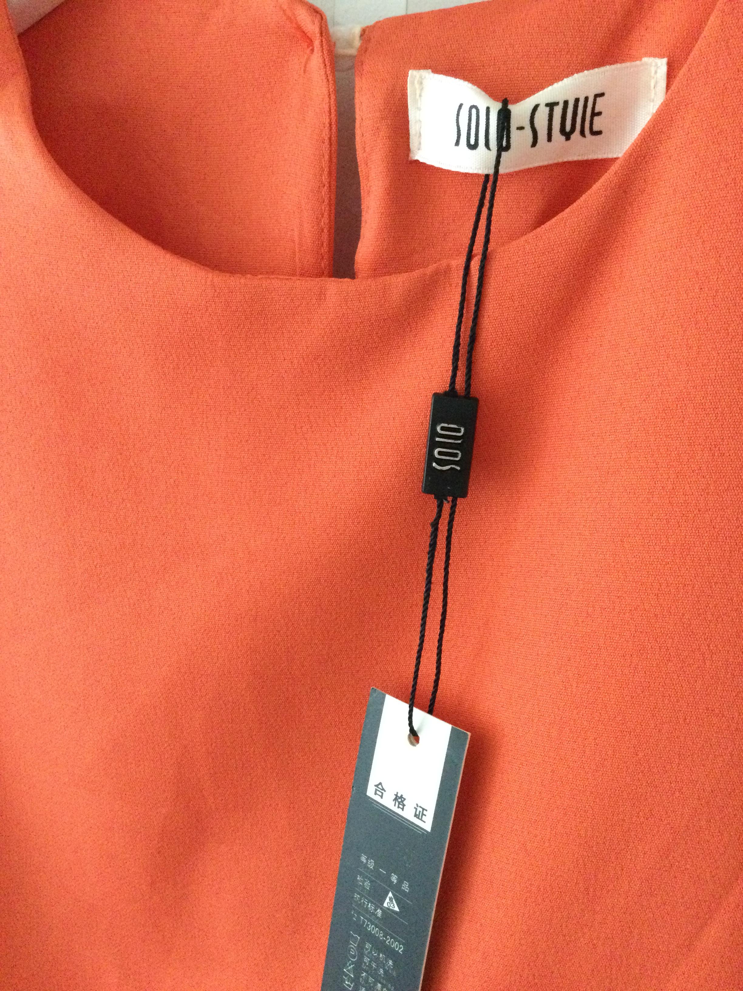 ชุดเซตเสื้อแขนกุดสีส้มมาพร้อมกระโปรงผ้าทอลายโบฮีเมียนทรงเอ