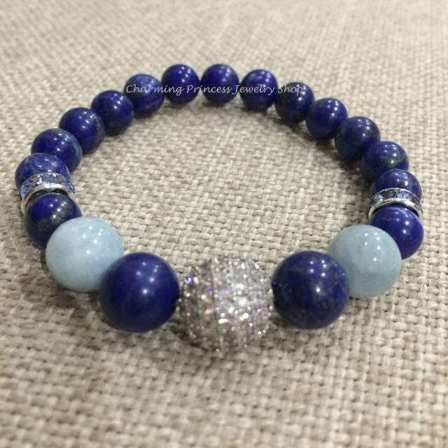 Lapis Lazuli and Aquamarine ลาปิส ลาซูลี่ และ อความารีน เอาชนะความวิตกกังวล ขจัดความวุ่นวายภายในจิตใจได้ ช่วยให้มั่นใจในการแสดงออกต่อหน้าสาธารณชน พบติดตัวไว้สำหรับการ Presentation หรือ ปาฐกถาต่อหน้าคนหมู่มาก ประดับลูกบอล CZ วิ้งวิ้ง