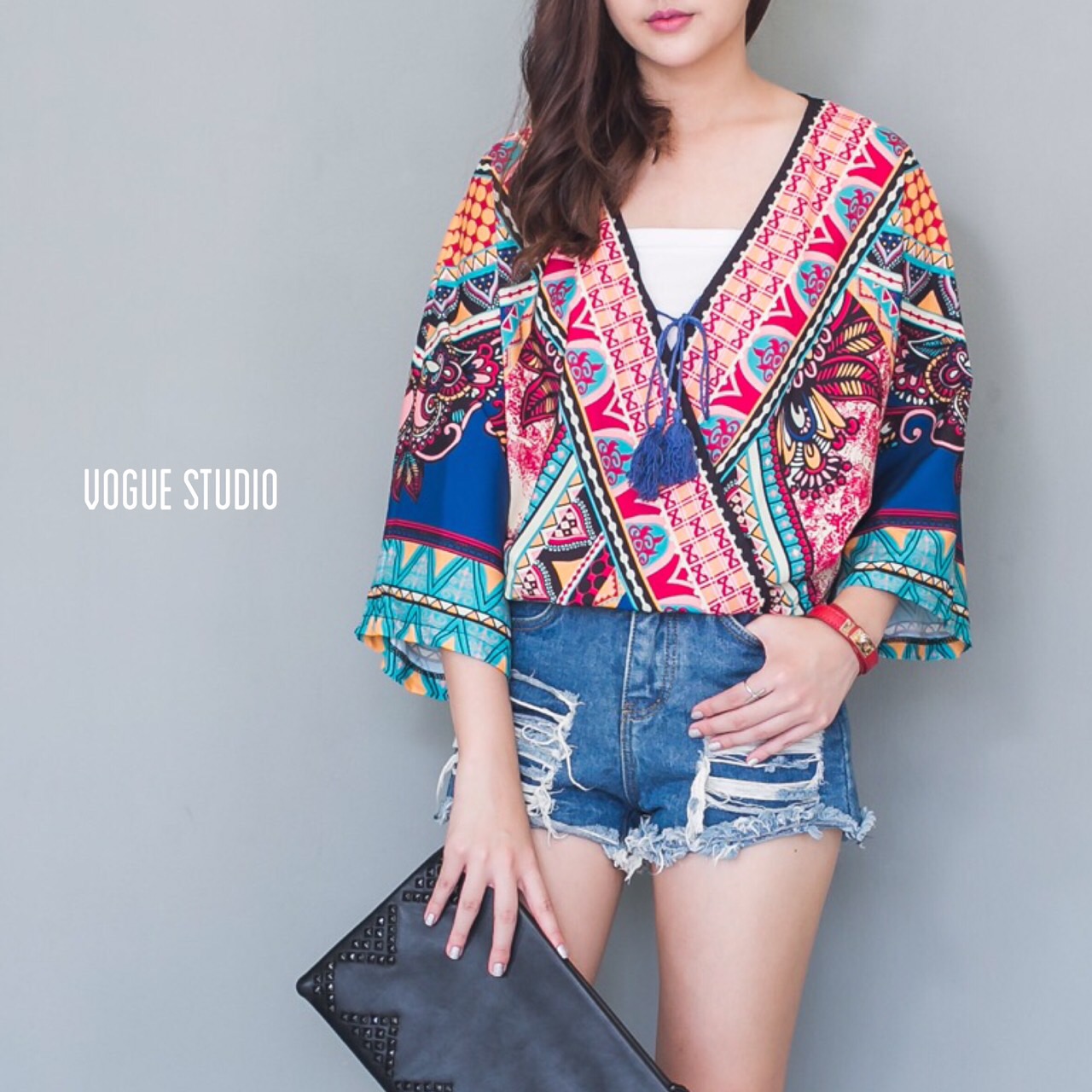 เสื้อคอวี จั๊มเอว ผูกโบว์ที่อก ปริ้นลายโบฮีเมียนสไตล์เกาหลี