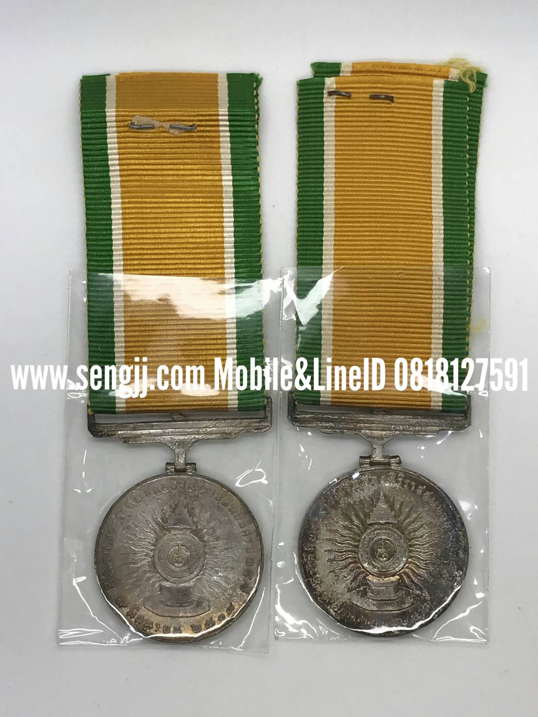 เหรียญแพรแถบเงิน ในหลวง ครองราชย์ 25 ปี พ.ศ.2514