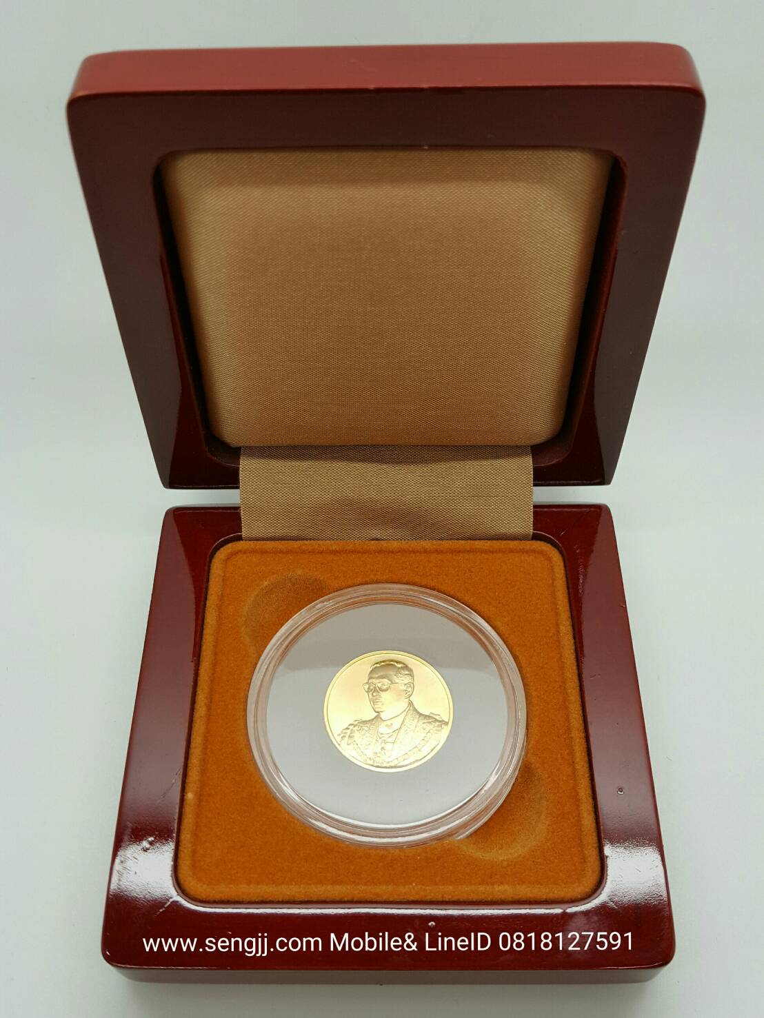 เหรียญทองคำที่ระลึก 7 รอบ 84 พรรษา ในหลวง พ.ศ.2554