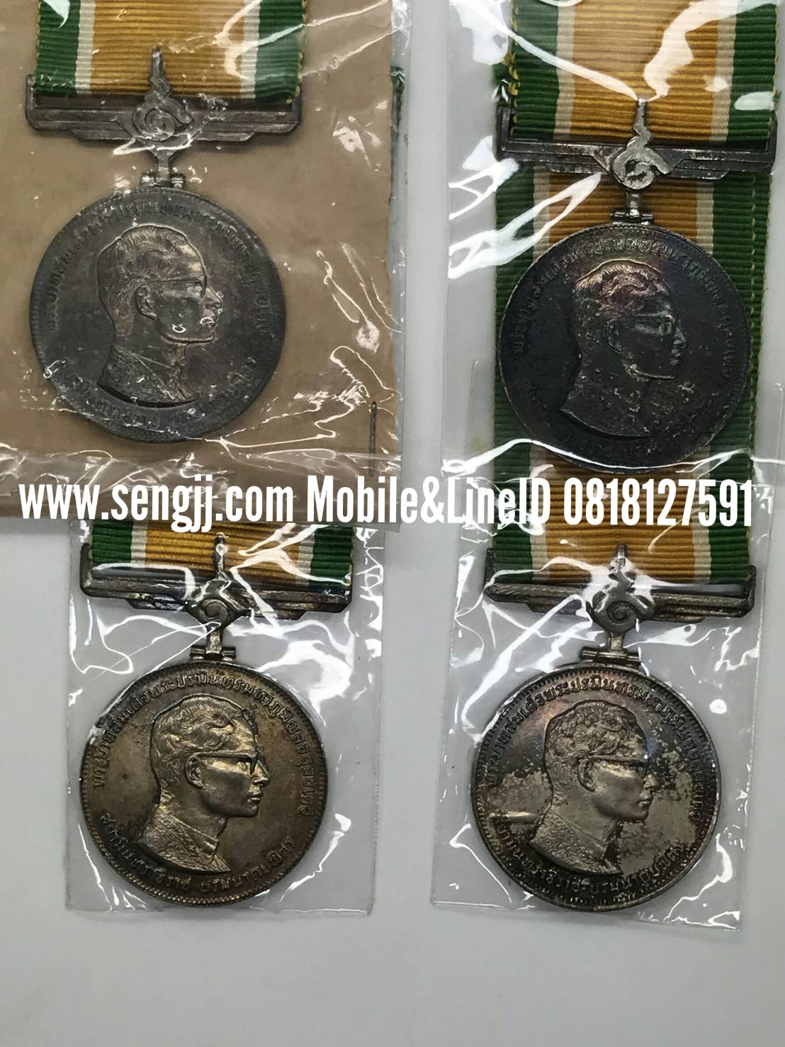 เหรียญแพรแถบเงิน ในหลวง ครองราชย์ 25 ปี พ.ศ.2514