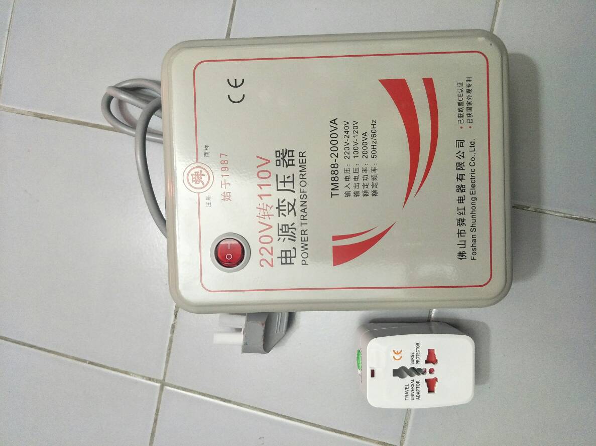 OT23 หม้อแปลงไฟ 220V เป็น 110V ขนาด 2000 วัตต์ พร้อมปลั๊กหัวแปลง Universal