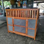 กรงกระต่ายพร้อมคอกไม้ด้านบน