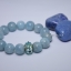 สร้อยข้อมือ อความารีน (Aquamarine) เกรด AAA ขนาด 10 มิล แต่งหัวลูกปัดดอกไม้สีฟ้า
