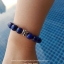 Lapis Lazuli ลาปิส ลาซูลี่, ลาพิส ลาซูลี่ 10 mm นําความสุขใจ ความสมหวังและมีชีวิตที่สุขสบาย ทำให้เกิดความรักเข้าใจในหมู่พวกพ้องและหุ้นส่วนในการทําธุรกิจ ประดับ“นกฮูก” เงินแท้ สัญลักษณ์แห่งความสุขและโชคดี