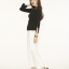 เสื้อทอknit ทรงผ่าแขนและแต่งห่วง มาพร้อมสร้อยห่วง เข้ากันสุดๆค่ะ